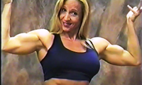Kat is a 5'3" 155-pound muscular bodybuilder. Sharon is a 5'7" 140-pound fitness model. In this clip, they talk about their strength and do various lifts. In this video Kat leg presses Sharon then Sharon does the same to Kat. Kat and Sharon are so strong they find this exercise easy.