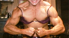 Christine Enval l- Very muscular Australian FBB flexing and bantering with the cameramen in this 1990's film shoot…