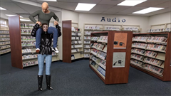 Hey we know we always have to be quiet in the library well! melinda wanted to have some fun with her boyfriend! they were looking at books and he couldn't reach them and she said here I would give you a boost! and before you knew it he was on her shoulders! This is where the animation takes place to enjoy! it's a quick one but a funny one! 